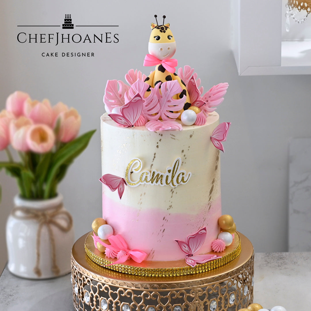 pink giraffe baby shower cake