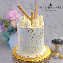 Load image into Gallery viewer, White and gold cake.
